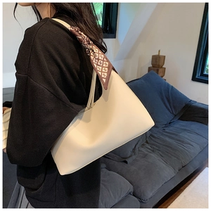 Cream white underarm shoulder bag for women with decorative geometric patterned silk scarf