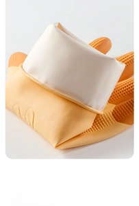 Close-up of yellow latex cleaning gloves featuring non-slip waffle texture palm detail