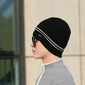 Men's thermal knit beanie in black with grey stripes and fleece lining for winter