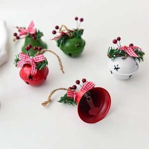 Red white and green Christmas iron bells with pine needles and plaid ribbon bows