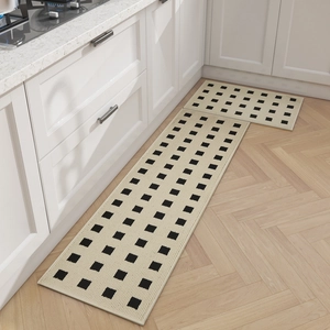 Waterproof kitchen rug set with black and beige checkerboard pattern on wood floor