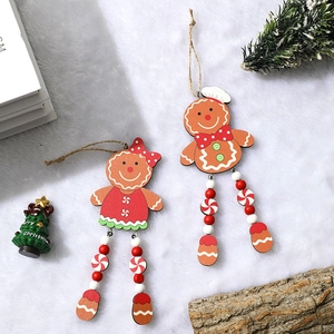 Wooden gingerbread man and woman Christmas tree hanging ornaments with long beaded legs