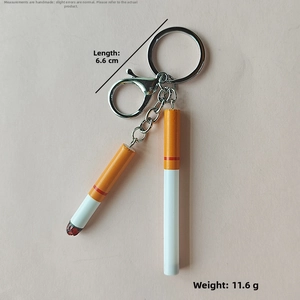 Detailed size view of realistic cigarette keychain showing 6.6cm length and 11.6g weight
