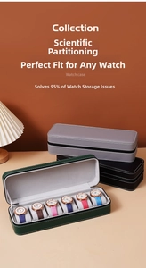 Detail of leather watch box featuring six separate slots and soft grey lining