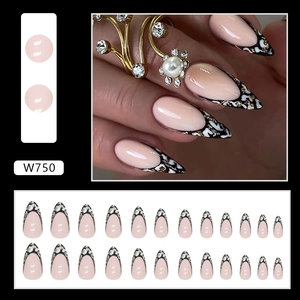 Almond-shaped leopard print press-on nails with glitter French tips and nude base