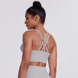 Detail of grey sports bra with multi-strap criss-cross back and wide elastic support band