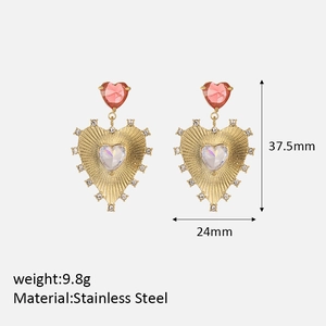 Detail view of irregular gold stainless steel heart earrings with zircon inlay and dimensions