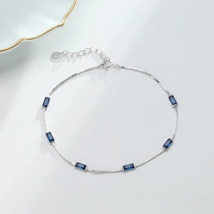 Elegant 925 sterling silver chain bracelet with seven rectangular deep blue gemstones