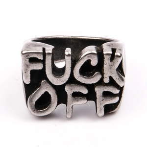 Close-up of retro punk style titanium steel ring with镂空 hollow letter design