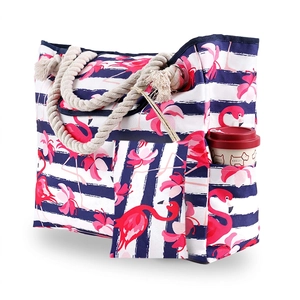 Detail of nautical canvas tote bag with pink flamingo print and thick cotton rope handles