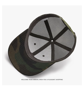 Detail view of the interior construction and breathable mesh of the camouflage trucker hat