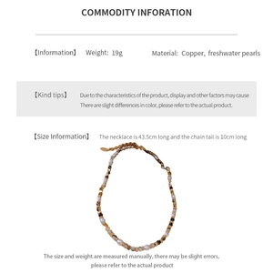 Detail view of freshwater pearl necklace showing 43.5cm length and brass beads