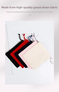Close-up of velvet drawstring jewelry pouches in various colors with soft texture