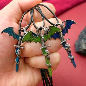Handheld vintage dragon and sword pendant necklaces with blue and green luminous enamel detailing