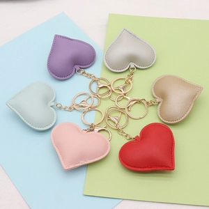 Set of 6 PU leather heart-shaped keychains in various colors with golden metal rings