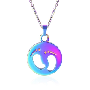 Macro view of iridescent rainbow stainless steel round pendant with baby footprint cutout