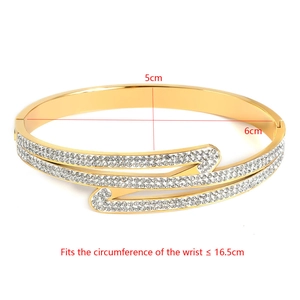 Detail of rose gold bangle with crisscross design and white zircons, 5cm x 6cm size