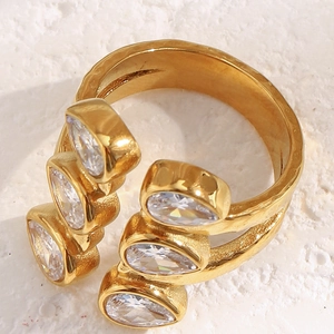 Macro view of 18K gold-plated double-layer ring with sparkling teardrop zircon stones