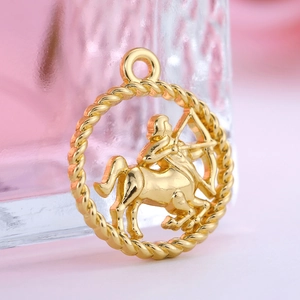 Macro shot of a golden Sagittarius zodiac charm with a detailed rope-textured circular frame