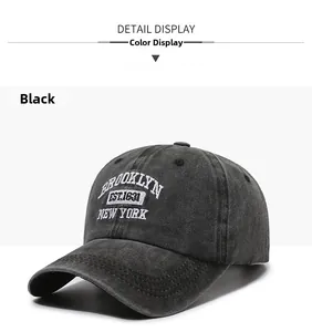 Detail of vintage washed black cotton baseball cap with Brooklyn embroidery and stitching