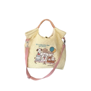 Quilted yellow embroidery tote bag with dog pattern and pink crossbody strap