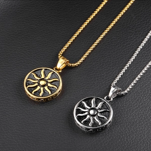 Mens sun totem necklaces in gold and silver finish on black leather texture