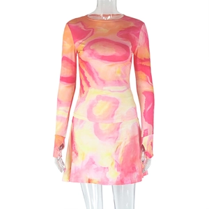 Detail of floral marble print mesh two-piece set with long sleeves and thumbholes