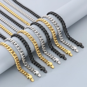 Parallel layout of 10mm Miami Cuban link bracelets in gold, silver, and black finishes