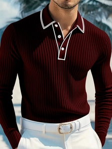 Detail of burgundy ribbed knit long sleeve Polo shirt with white contrast trim