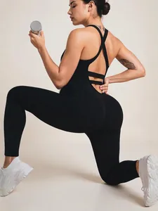 Black seamless backless yoga unitard with crossover straps for fitness and body sculpting