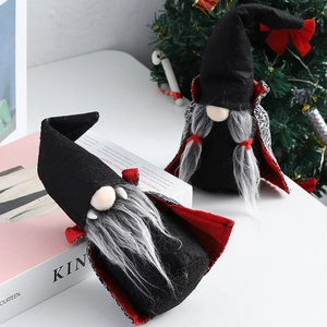 Detailed view of Halloween gnomes featuring black capes with red lining and vampire fangs