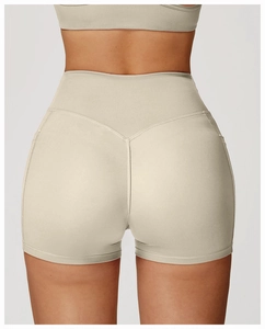 Detail view of high waisted yoga shorts featuring V-shape back stitching for a lifting effect