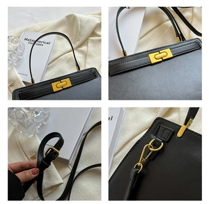 Detailed close-up of a black PU leather Kelly bag with gold-tone hardware and clasp