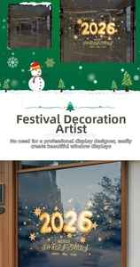 Detail of 2026 Christmas window stickers with golden stars and festive static clings