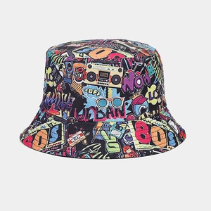 Close-up of retro graffiti print on black canvas bucket hat featuring 80s urban motifs