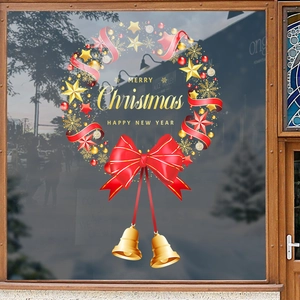 Christmas wreath static window sticker with red bow and gold bells for festive decoration