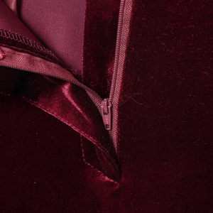 Elegant burgundy velvet blazer featuring premium texture and smooth metal zipper detail