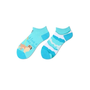 Detail of low-cut cotton socks with cute cartoon dog and wave pattern in sky blue and white