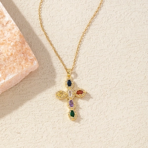 Gold-plated cross necklace with colorful oval gemstones and shimmering zircon accents