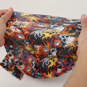 Detail showing high-elasticity fabric and vintage skull fire print on cycling bandana