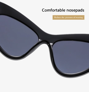 Detail of comfortable nose pads on black cat-eye sunglasses with resin frame