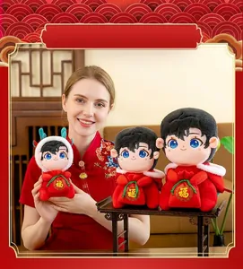 2024 Chinese Zodiac dragon plush doll mascot featuring festive red outfit and Fu bag