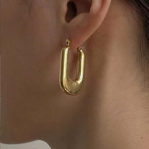 Elegant gold plated brass U-shaped hoop earrings with vertical stripe texture