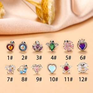 Assortiment de clous d'oreilles cœur et couronne en acier avec zircons colorés