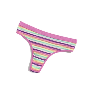 Flat lay of colorful ribbed cotton thong for women with purple trim and striped pattern