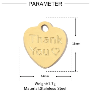 Macro view of gold stainless steel heart pendant with Thank You engraving and 16mm height