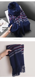 Detail showing the thick fringe edges and soft texture of this blue plaid cashmere-like scarf