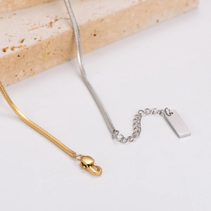 Minimalist square snake chain bracelet in gold and silver steel with lobster clasp closure