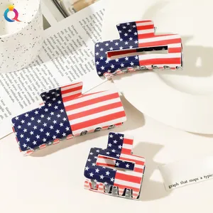 Three different sizes of American flag hair claws with blue stars and red stripes