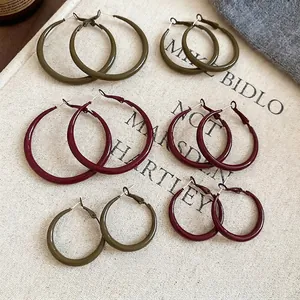 Minimalist geometric round hoop earrings in olive green and burgundy red colors